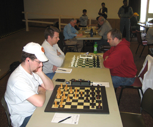 Kyle Miles on board 1 in round 5. David Long and Tobias Simpson on board 2